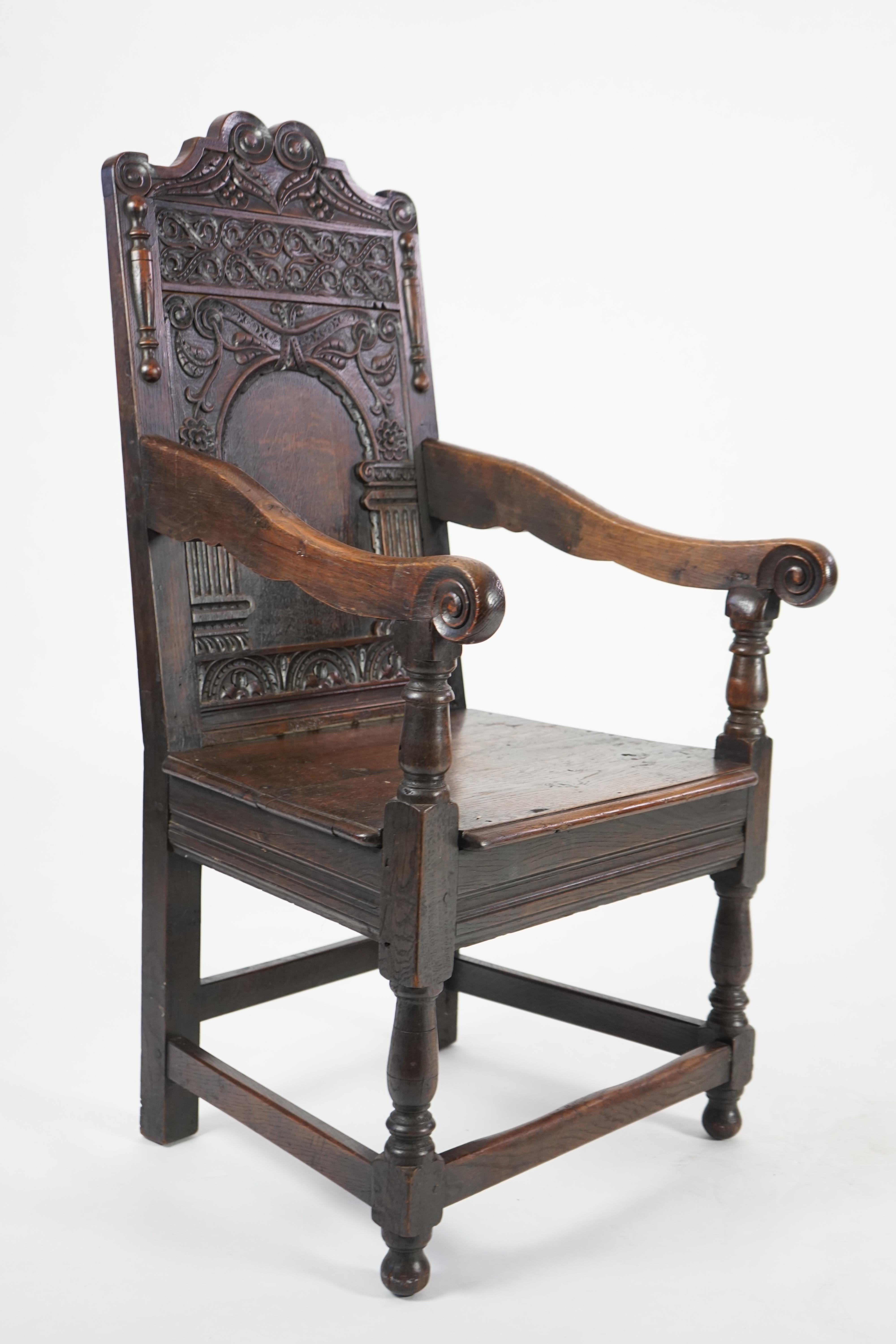 A pair of 17th century style oak Wainscot chairs